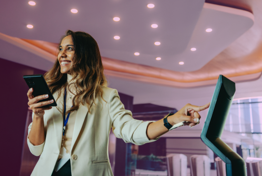 A Manager is tracking Employee Attendance with an app on their phone.